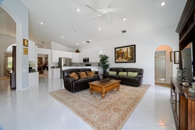 This stunning residence features 3 spacious bedrooms and 3 full on Westchester Golf and Country Club in Florida - for sale on GolfHomes.com, golf home, golf lot