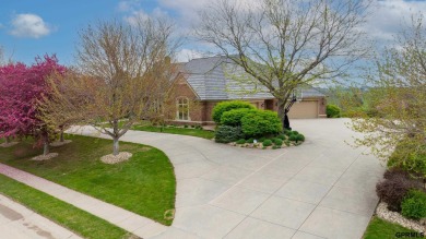 This gorgeous, custom-built home sits on a nearly 1-acre lot on Indian Creek Golf Club in Nebraska - for sale on GolfHomes.com, golf home, golf lot