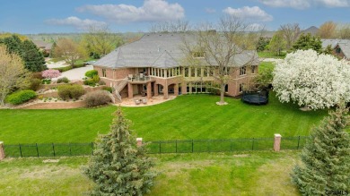 This gorgeous, custom-built home sits on a nearly 1-acre lot on Indian Creek Golf Club in Nebraska - for sale on GolfHomes.com, golf home, golf lot