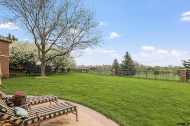 This gorgeous, custom-built home sits on a nearly 1-acre lot on Indian Creek Golf Club in Nebraska - for sale on GolfHomes.com, golf home, golf lot