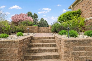 This gorgeous, custom-built home sits on a nearly 1-acre lot on Indian Creek Golf Club in Nebraska - for sale on GolfHomes.com, golf home, golf lot