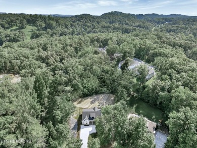 Welcome to your relaxing dream home! Nestled on an expansive and on Tellico Village Golf Club in Tennessee - for sale on GolfHomes.com, golf home, golf lot