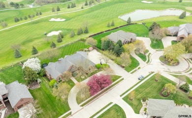 This gorgeous, custom-built home sits on a nearly 1-acre lot on Indian Creek Golf Club in Nebraska - for sale on GolfHomes.com, golf home, golf lot