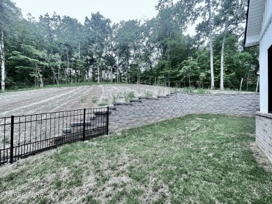 Welcome to your relaxing dream home! Nestled on an expansive and on Tellico Village Golf Club in Tennessee - for sale on GolfHomes.com, golf home, golf lot