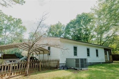 Check out this very welcoming home with a nice leveled front and on Nob North Golf Course in Georgia - for sale on GolfHomes.com, golf home, golf lot