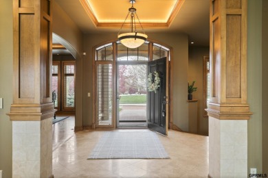 This gorgeous, custom-built home sits on a nearly 1-acre lot on Indian Creek Golf Club in Nebraska - for sale on GolfHomes.com, golf home, golf lot