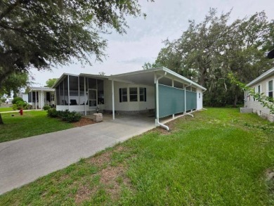 This 2 Bedroom, 2 Bathroom is Light and Bright!! The Livingroom on Plantation Golf Club in Florida - for sale on GolfHomes.com, golf home, golf lot