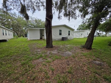 This 2 Bedroom, 2 Bathroom is Light and Bright!! The Livingroom on Plantation Golf Club in Florida - for sale on GolfHomes.com, golf home, golf lot