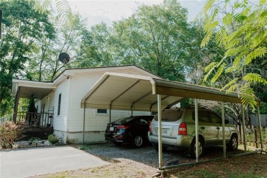 Check out this very welcoming home with a nice leveled front and on Nob North Golf Course in Georgia - for sale on GolfHomes.com, golf home, golf lot