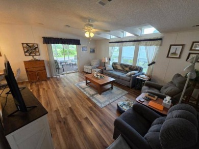 This 2 Bedroom, 2 Bathroom is Light and Bright!! The Livingroom on Plantation Golf Club in Florida - for sale on GolfHomes.com, golf home, golf lot