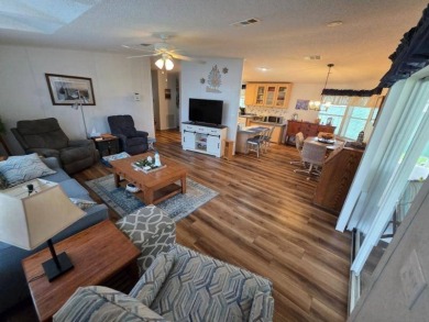 This 2 Bedroom, 2 Bathroom is Light and Bright!! The Livingroom on Plantation Golf Club in Florida - for sale on GolfHomes.com, golf home, golf lot