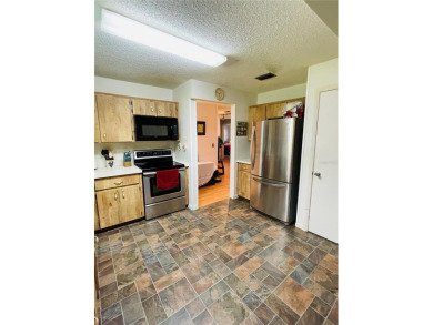 The Florida Lifestyle awaits! Don't miss this End Unit villa on On Top of the World Golf Course in Florida - for sale on GolfHomes.com, golf home, golf lot