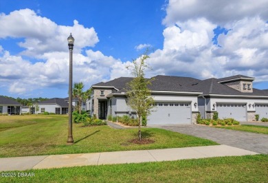 This end-unit townhome located in the highly sought after on Plantation Bay Golf and Country Club in Florida - for sale on GolfHomes.com, golf home, golf lot