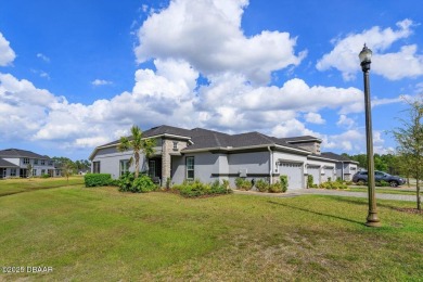 This end-unit townhome located in the highly sought after on Plantation Bay Golf and Country Club in Florida - for sale on GolfHomes.com, golf home, golf lot
