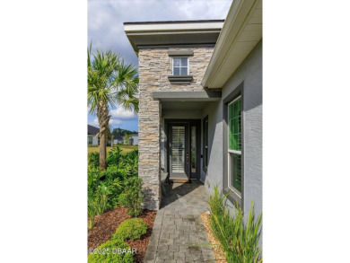 This end-unit townhome located in the highly sought after on Plantation Bay Golf and Country Club in Florida - for sale on GolfHomes.com, golf home, golf lot