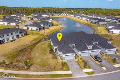 This end-unit townhome located in the highly sought after on Plantation Bay Golf and Country Club in Florida - for sale on GolfHomes.com, golf home, golf lot