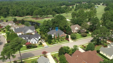 An unusual architectural creation with emphasis on simple on Magnolia Greens Golf Plantation in North Carolina - for sale on GolfHomes.com, golf home, golf lot