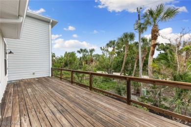 Experience coastal living at its finest in this stunning Sanibel on The Sanctuary Golf Club in Florida - for sale on GolfHomes.com, golf home, golf lot