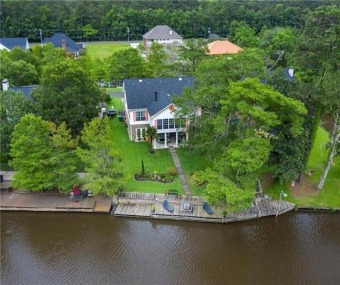 WATERFRONT PROPERTY. Custom built home on Calcasieu River with a on The National Golf Club of Louisiana in Louisiana - for sale on GolfHomes.com, golf home, golf lot