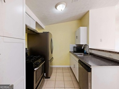 Discover cozy, low-maintenance living in this charming end-unit on Heritage Golf Links in Georgia - for sale on GolfHomes.com, golf home, golf lot