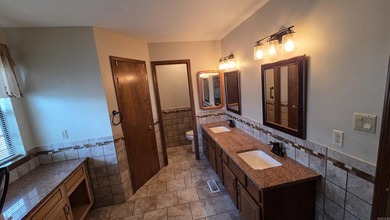 Welcome to market this beautifully updated 3 bedroom, 2 bath on Indian Hills Country Club in Arkansas - for sale on GolfHomes.com, golf home, golf lot