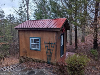 This refined mountain retreat delivers a rare combination of on Old Union Golf Course in Georgia - for sale on GolfHomes.com, golf home, golf lot
