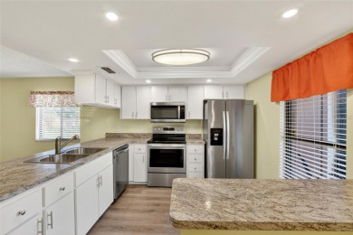 Front porch Water view. Wide Open and bright. Clean. Well on Beacon Woods Golf Club in Florida - for sale on GolfHomes.com, golf home, golf lot