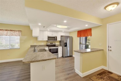 Front porch Water view. Wide Open and bright. Clean. Well on Beacon Woods Golf Club in Florida - for sale on GolfHomes.com, golf home, golf lot
