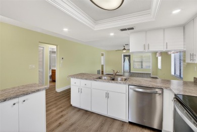 Front porch Water view. Wide Open and bright. Clean. Well on Beacon Woods Golf Club in Florida - for sale on GolfHomes.com, golf home, golf lot