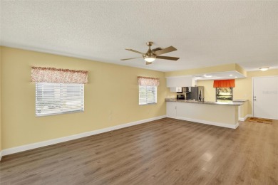 Front porch Water view. Wide Open and bright. Clean. Well on Beacon Woods Golf Club in Florida - for sale on GolfHomes.com, golf home, golf lot