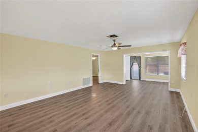 Front porch Water view. Wide Open and bright. Clean. Well on Beacon Woods Golf Club in Florida - for sale on GolfHomes.com, golf home, golf lot