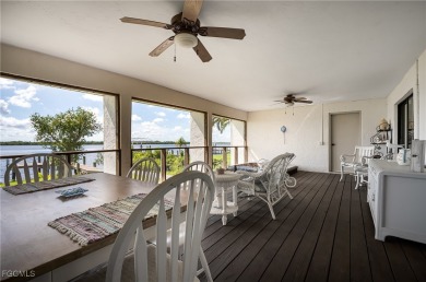 This waterfront home places the Peace River right in your on Deep Creek Golf Club in Florida - for sale on GolfHomes.com, golf home, golf lot