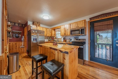 This refined mountain retreat delivers a rare combination of on Old Union Golf Course in Georgia - for sale on GolfHomes.com, golf home, golf lot