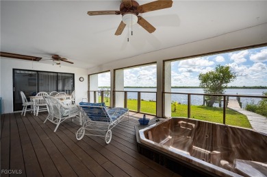 This waterfront home places the Peace River right in your on Deep Creek Golf Club in Florida - for sale on GolfHomes.com, golf home, golf lot