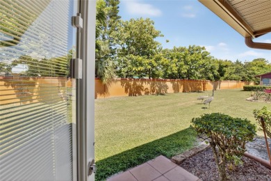 Front porch Water view. Wide Open and bright. Clean. Well on Beacon Woods Golf Club in Florida - for sale on GolfHomes.com, golf home, golf lot