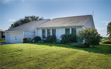This waterfront home places the Peace River right in your on Deep Creek Golf Club in Florida - for sale on GolfHomes.com, golf home, golf lot