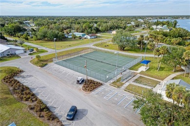 This waterfront home places the Peace River right in your on Deep Creek Golf Club in Florida - for sale on GolfHomes.com, golf home, golf lot