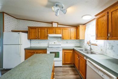 ** Port Charlotte Village was voted #1 manufactured home on Kings Gate Golf Club in Florida - for sale on GolfHomes.com, golf home, golf lot