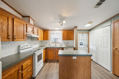 ** Port Charlotte Village was voted #1 manufactured home on Kings Gate Golf Club in Florida - for sale on GolfHomes.com, golf home, golf lot