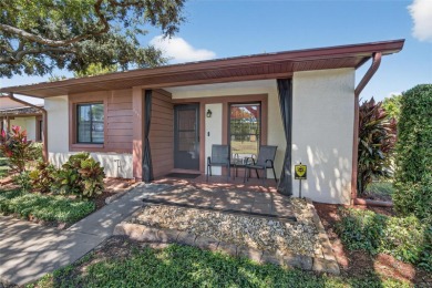 Front porch Water view. Wide Open and bright. Clean. Well on Beacon Woods Golf Club in Florida - for sale on GolfHomes.com, golf home, golf lot