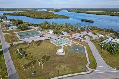 This waterfront home places the Peace River right in your on Deep Creek Golf Club in Florida - for sale on GolfHomes.com, golf home, golf lot
