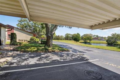 Front porch Water view. Wide Open and bright. Clean. Well on Beacon Woods Golf Club in Florida - for sale on GolfHomes.com, golf home, golf lot