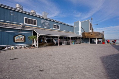 This waterfront home places the Peace River right in your on Deep Creek Golf Club in Florida - for sale on GolfHomes.com, golf home, golf lot