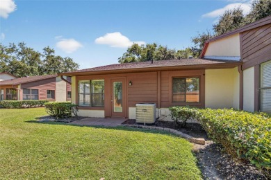 Front porch Water view. Wide Open and bright. Clean. Well on Beacon Woods Golf Club in Florida - for sale on GolfHomes.com, golf home, golf lot