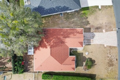 Welcome to this inviting 3-bedroom, 2-bathroom home nestled in a on Twisted Oaks Golf Club in Florida - for sale on GolfHomes.com, golf home, golf lot