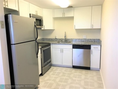 LOOK NO FURTHER! CAN BE RENTED RIGHT AWAY. THIS VERY CLEAN TOP on Flamingo Lakes Country Club in Florida - for sale on GolfHomes.com, golf home, golf lot