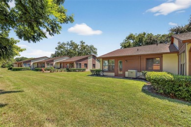 Front porch Water view. Wide Open and bright. Clean. Well on Beacon Woods Golf Club in Florida - for sale on GolfHomes.com, golf home, golf lot