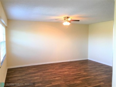 LOOK NO FURTHER! CAN BE RENTED RIGHT AWAY. THIS VERY CLEAN TOP on Flamingo Lakes Country Club in Florida - for sale on GolfHomes.com, golf home, golf lot