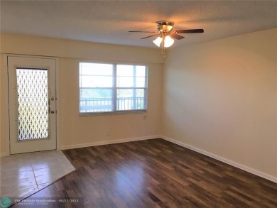 LOOK NO FURTHER! CAN BE RENTED RIGHT AWAY. THIS VERY CLEAN TOP on Flamingo Lakes Country Club in Florida - for sale on GolfHomes.com, golf home, golf lot