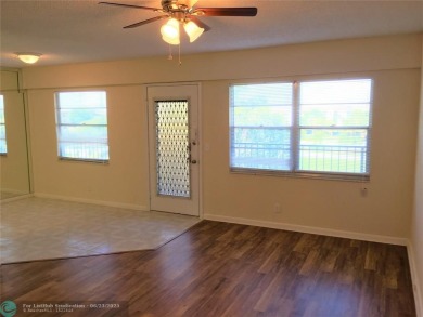LOOK NO FURTHER! CAN BE RENTED RIGHT AWAY. THIS VERY CLEAN TOP on Flamingo Lakes Country Club in Florida - for sale on GolfHomes.com, golf home, golf lot